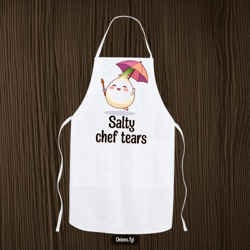Funny apron showing an onion character dancing in salt rain under a tiny umbrella, perfect for humorous cooking.