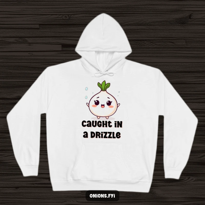 Funny hoodie depicting a surprised onion character juggling tiny, shining droplets, blending humor and the art of multitasking.