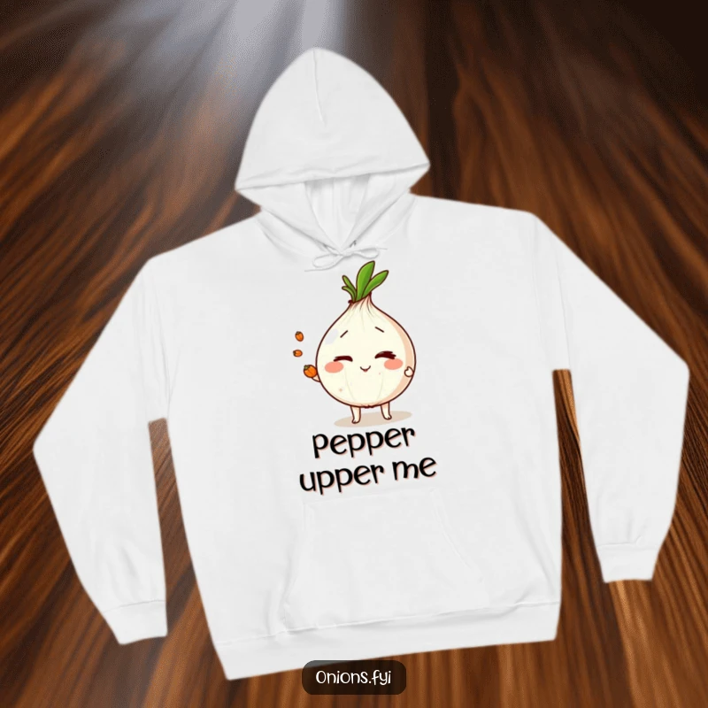 Cozy funny onion character winking and juggling peppercorns, a warm and humorous hoodie for displaying skills.
