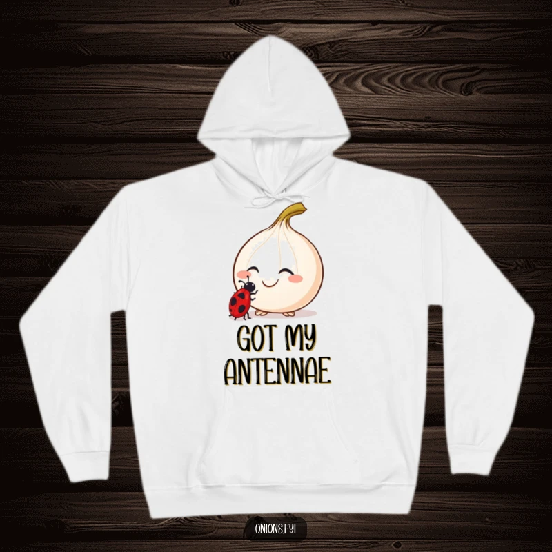 Funny Curious Onion Hoodie depicting a smiling onion with antennae examining a ladybug, perfect for cozy wear.