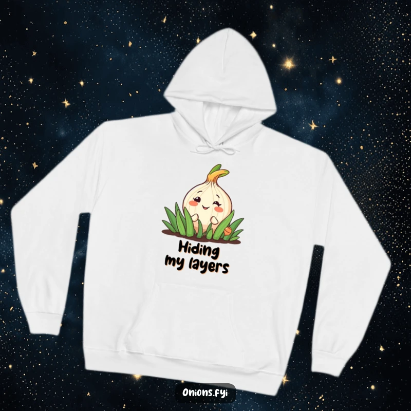 Funny hoodie showcasing a friendly onion character peeking from a garden patch, offering a warm and cheerful grin.