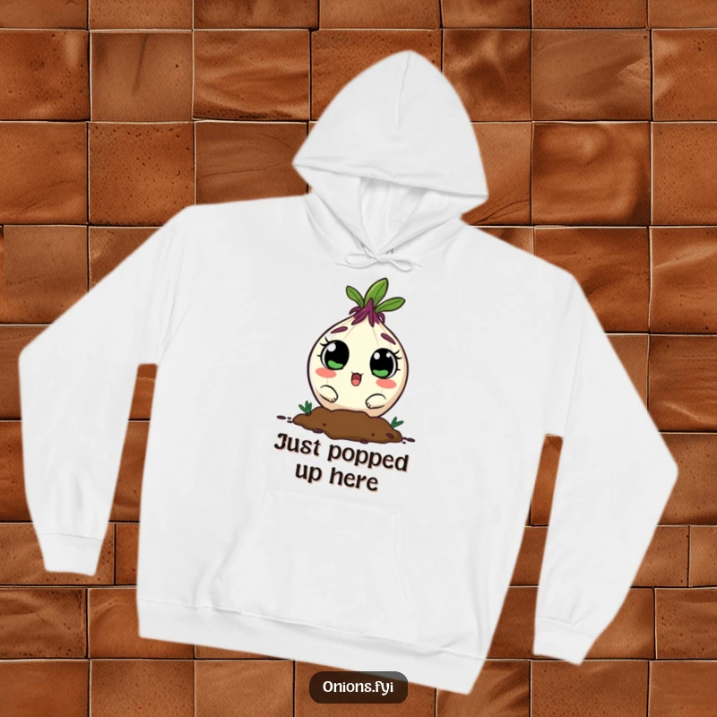 Funny onion character peeking from soil, wide-eyed and surprised, on a cozy and humorous hoodie.