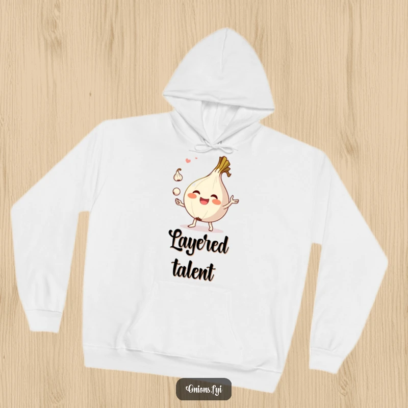 Funny hoodie with a happy onion character juggling garlic cloves, ideal for cozy laughs and kitchen vibes.