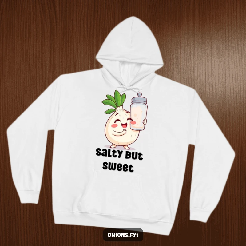 Funny Onion Hoodie: A charming kawaii onion winks, clutching a giant salt shaker, offering warmth and laughs.